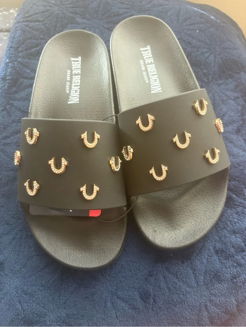 True Religion Black Slide Sandals with Gold Horsebit Studs